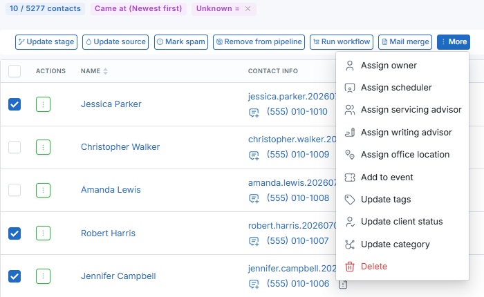 Contacts bulk action menu showing options to assign servicing advisor, writing advisor, and office location.